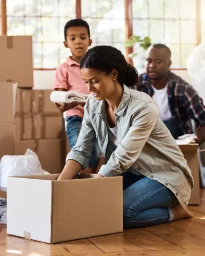 A family packing boxes